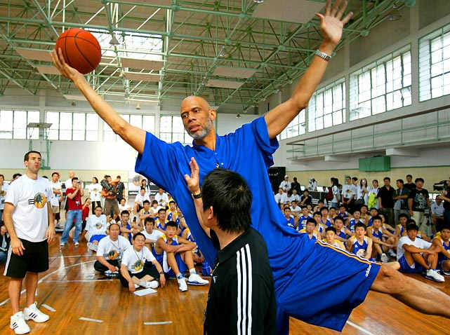 Kareem with kids at the 2005 Adidas Superstar Camp.